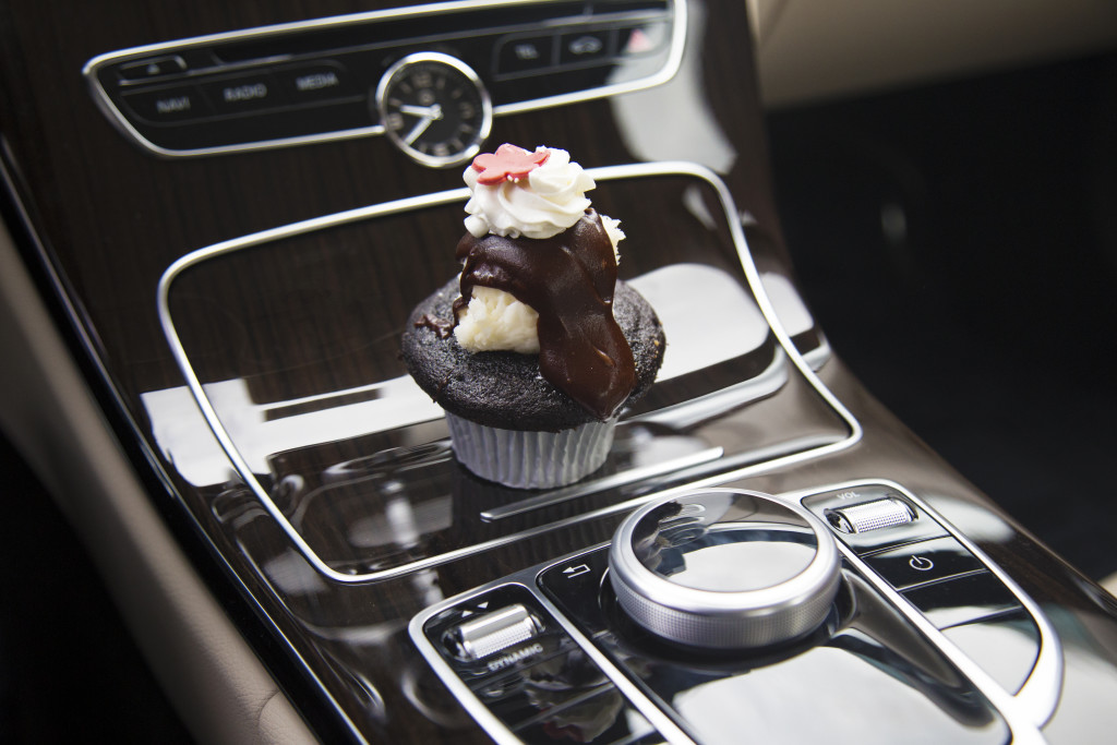 Night & Day cupcake sitting on Mercedes-Benz center console