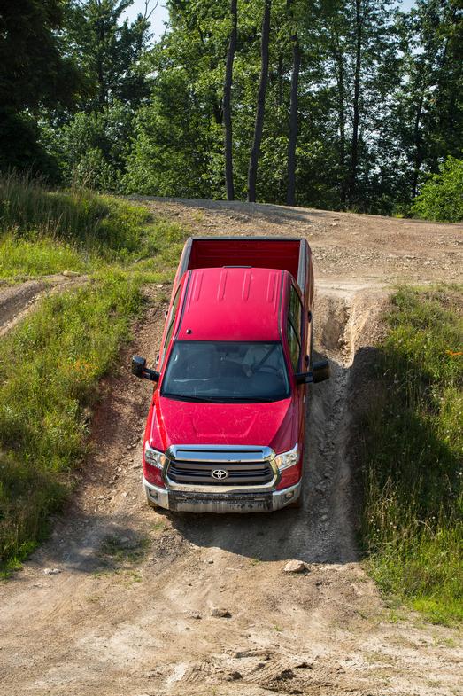 2014 tundra driving down a lil hill red